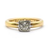 A gold single stone diamond ring,