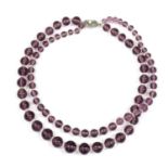 A two row graduated glass bead necklace,