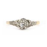 A gold single stone diamond ring,