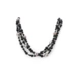 A three row onyx and cultured Tahitian pearl necklace, by Cellini,