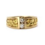 A 14ct gold two stone diamond ring,