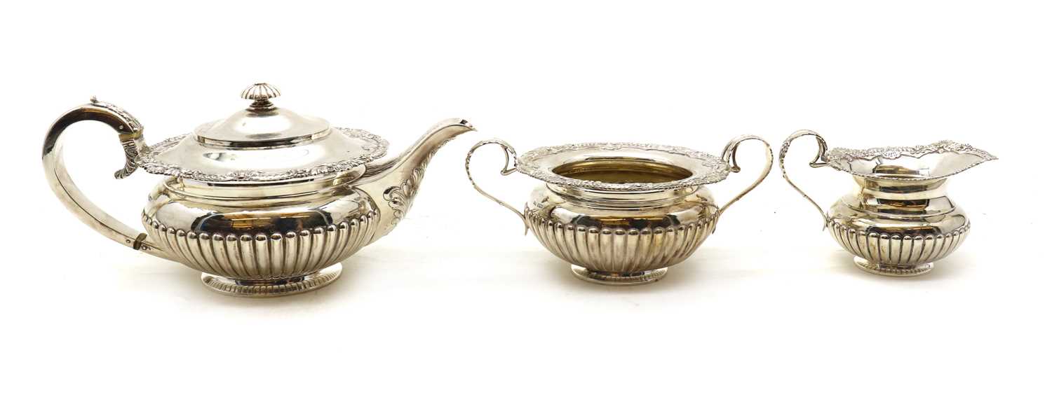 A three piece silver tea service,