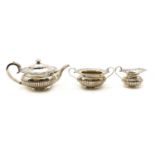 A three piece silver tea service,