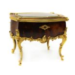 A brass mounted tortoiseshell jewellery box,