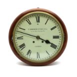 A mahogany wall clock,