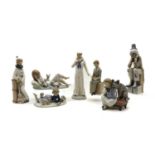 A collection of Lladro porcelain figures,