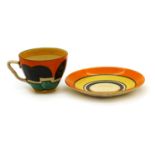 A Clarice Cliff 'Castellated Circle' teacup and saucer,