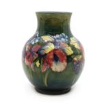 A Walter Moorcroft pottery 'Orchid' vase,