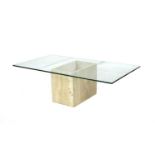 A travertine and glass coffee table,