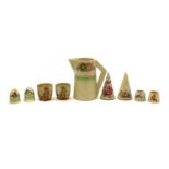 A collection of Clarice Cliff cruet items,