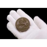 A 1956 Stockholm Equestrian Olympic bronze medal,