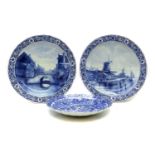 A pair of Delft pottery blue and white chargers,