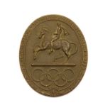 A 1956 Stockholm Equestrian Olympics participation medal,