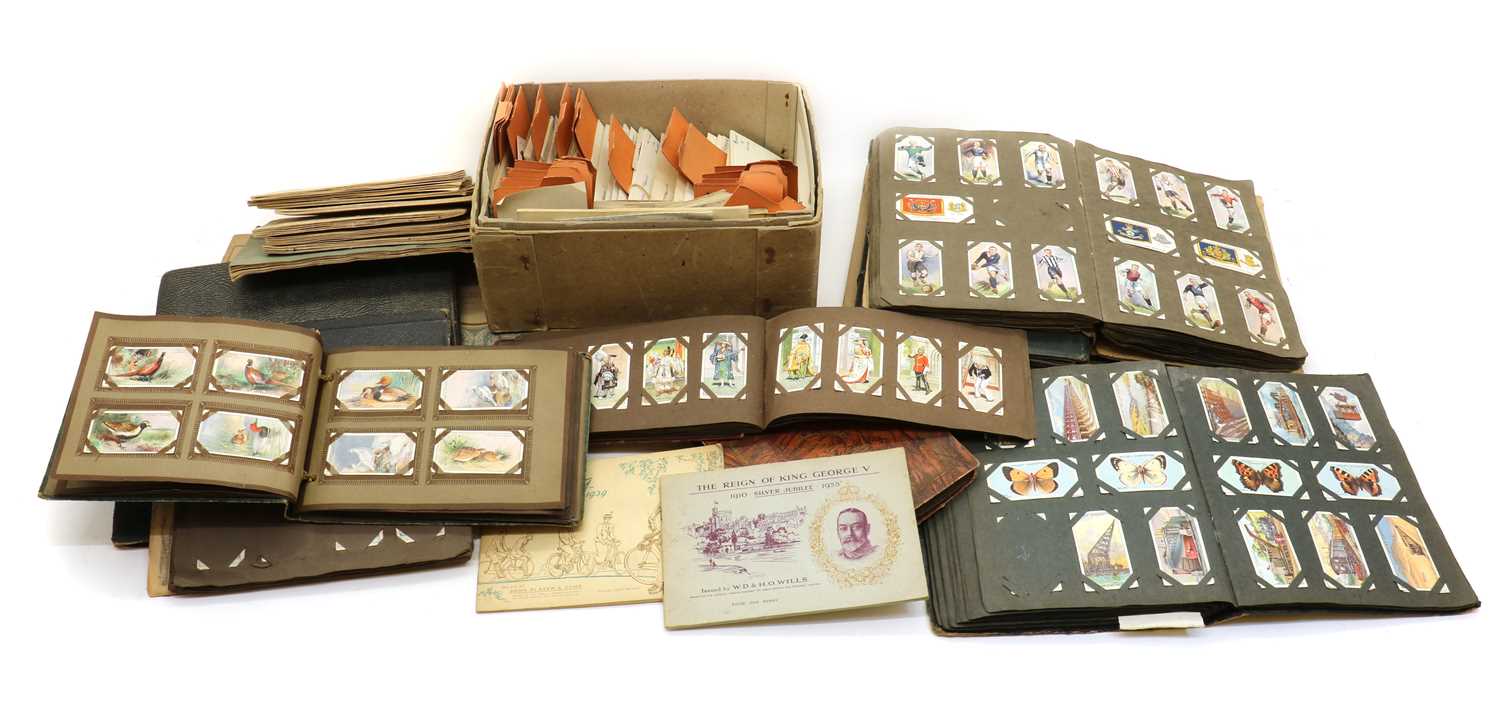 A large collection of cigarette cards,