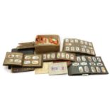 A large collection of cigarette cards,