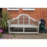 A teak Lutyens garden bench,