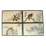 A collection of four Japanese embroidered panels,