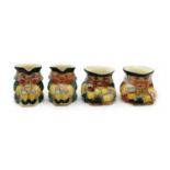 A collection of four Clarice Cliff miniature toby jugs,