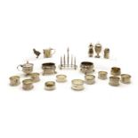 A collection of silver cruet items,