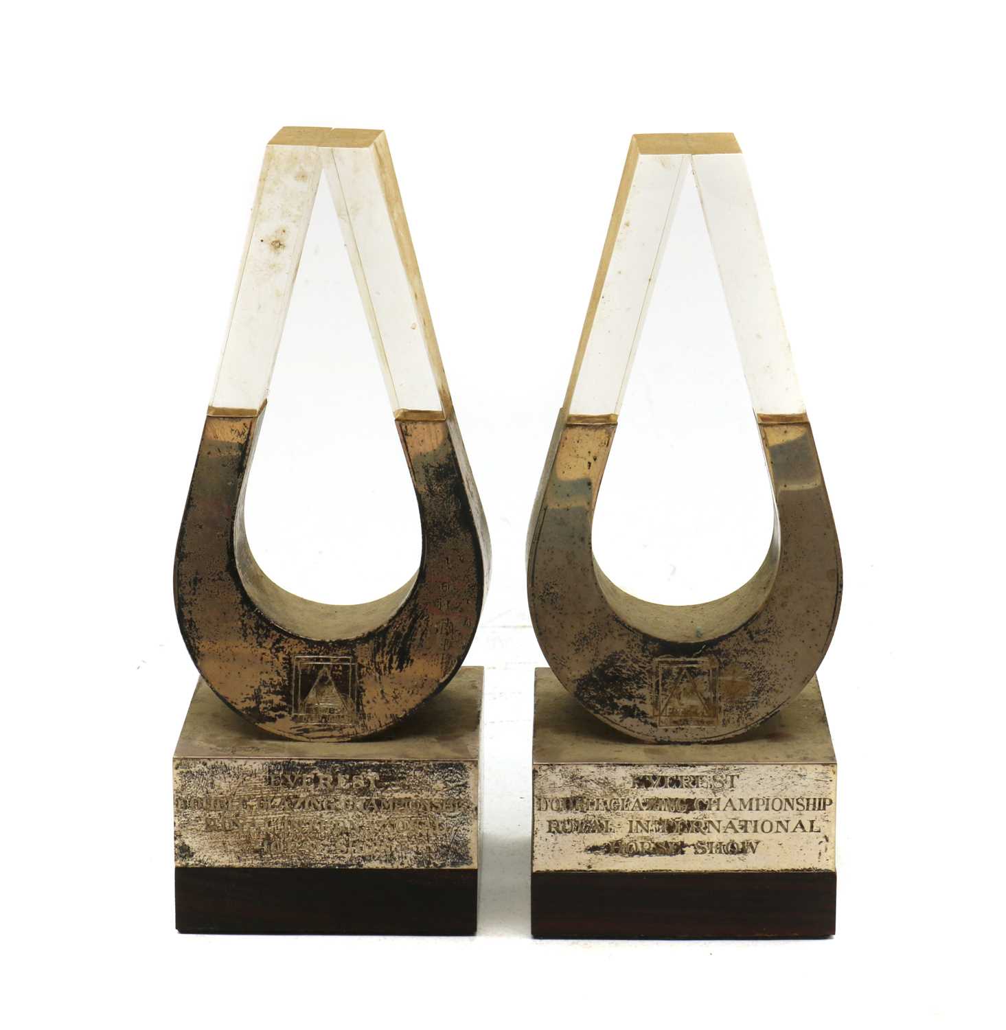 A pair of silver-mounted lucite trophies,