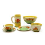 A collection of Clarice Cliff ‘Sungleam Crocus’ items,