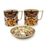 A pair of Crown Derby porcelain oversized mugs,