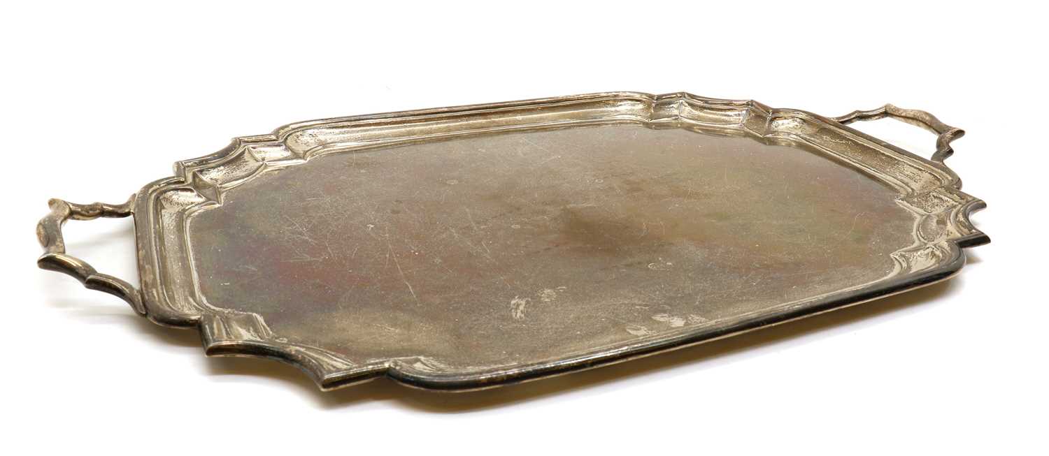 A silver twin handled tray,