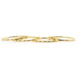 A set of gold bangles,