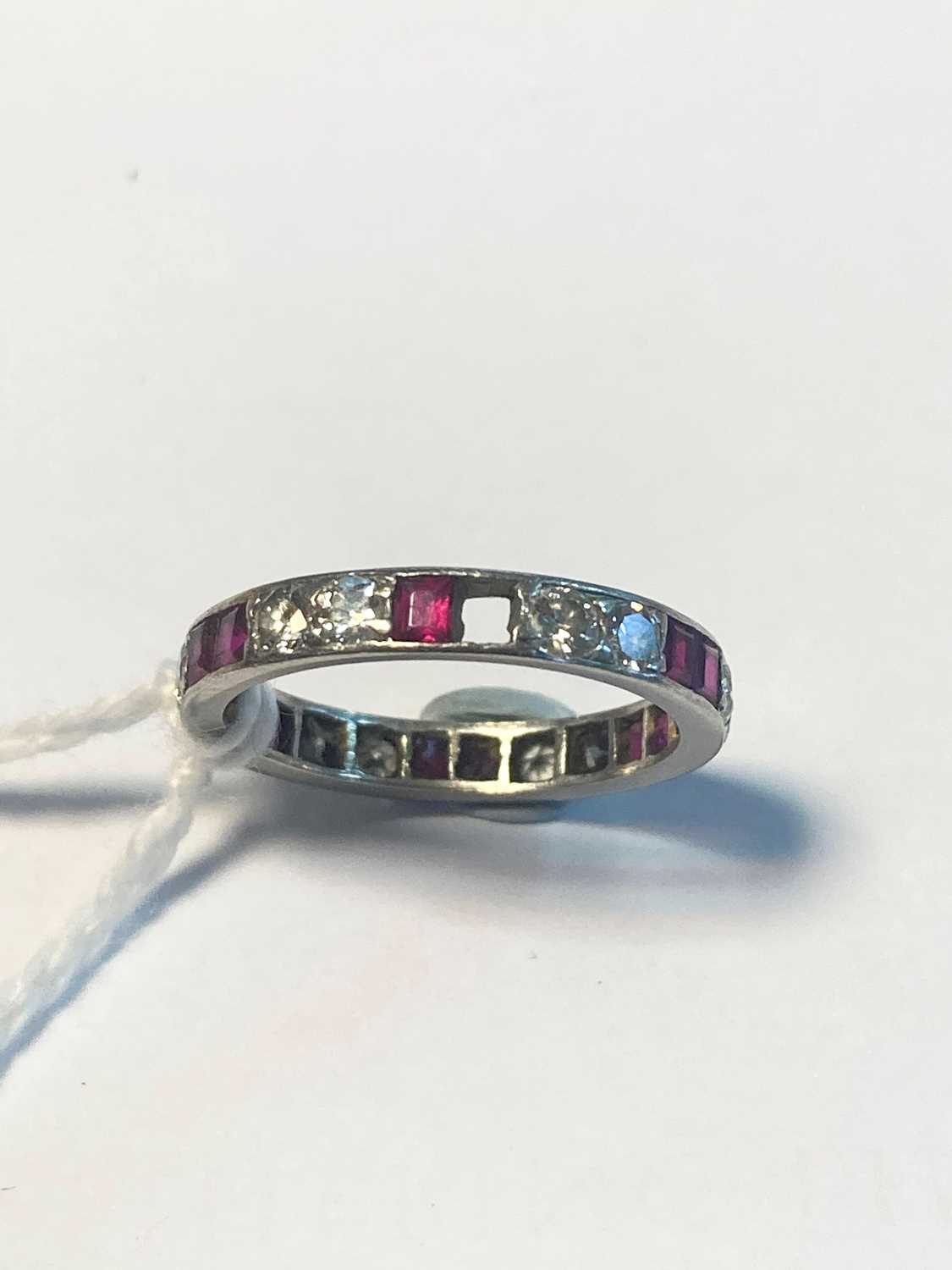 A synthetic ruby and diamond full eternity ring, - Image 3 of 3