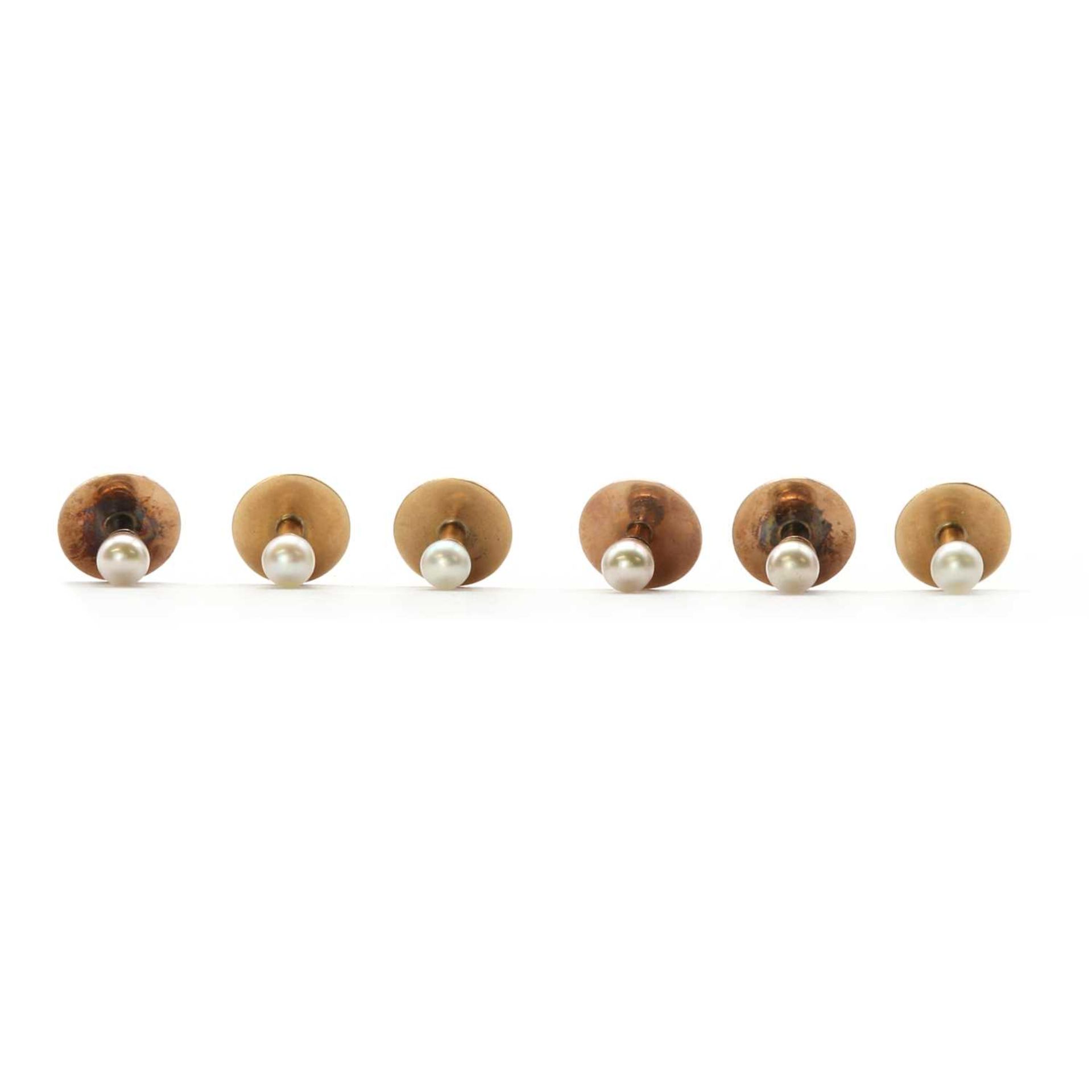 A cased set of gold cultured pearl dress studs,