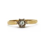 An 18ct gold single stone diamond ring,