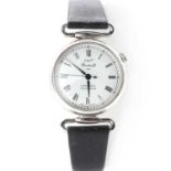 A silver Joseph and Thomas Windmills mechanical 1st edition strap watch,