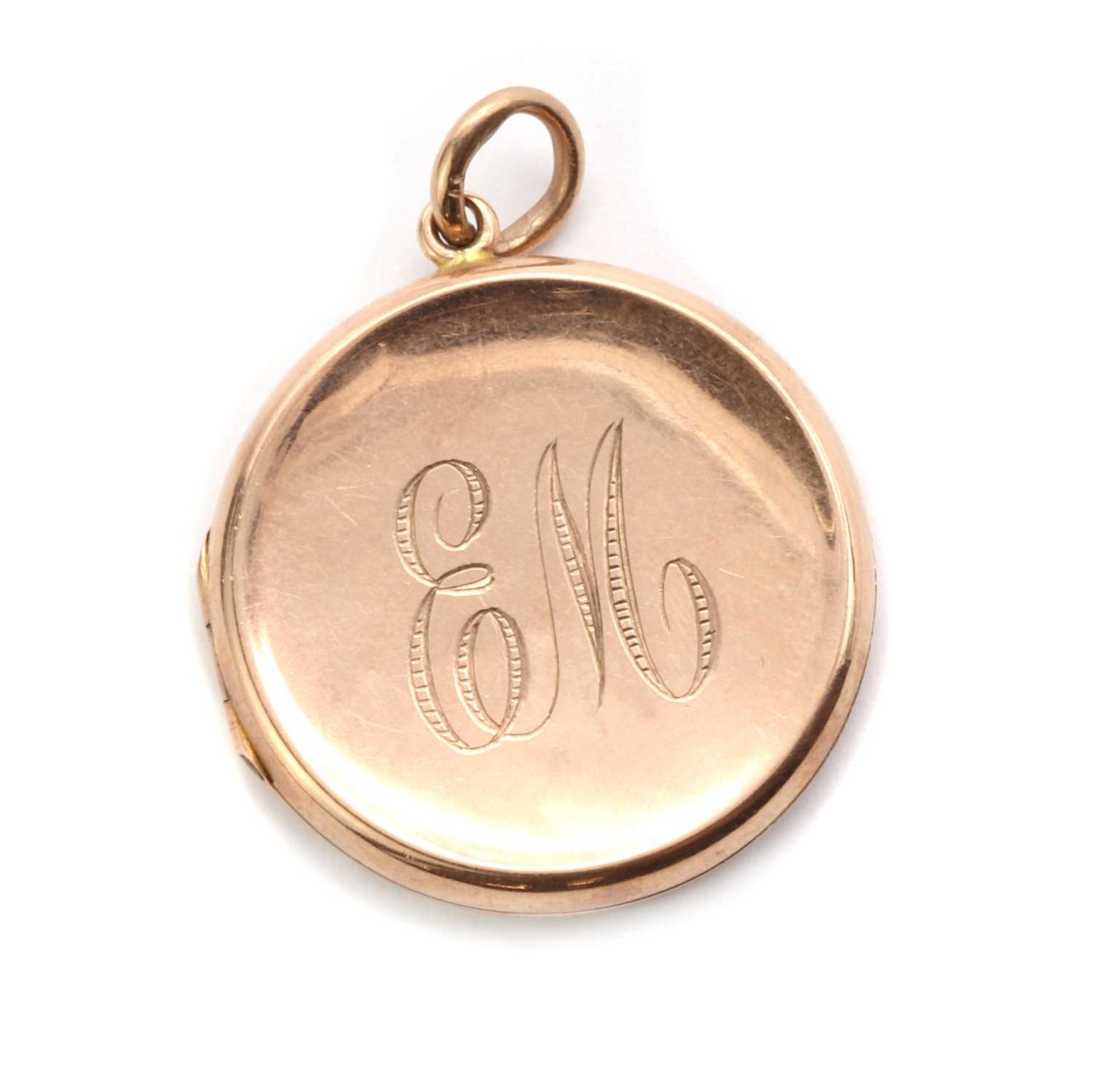 An Edwardian 9ct gold locket,