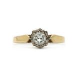 A gold single stone diamond ring,