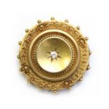 A Victorian 15ct gold diamond set shield brooch,