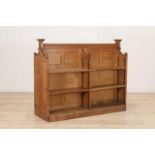 An oak double-sided bookcase,