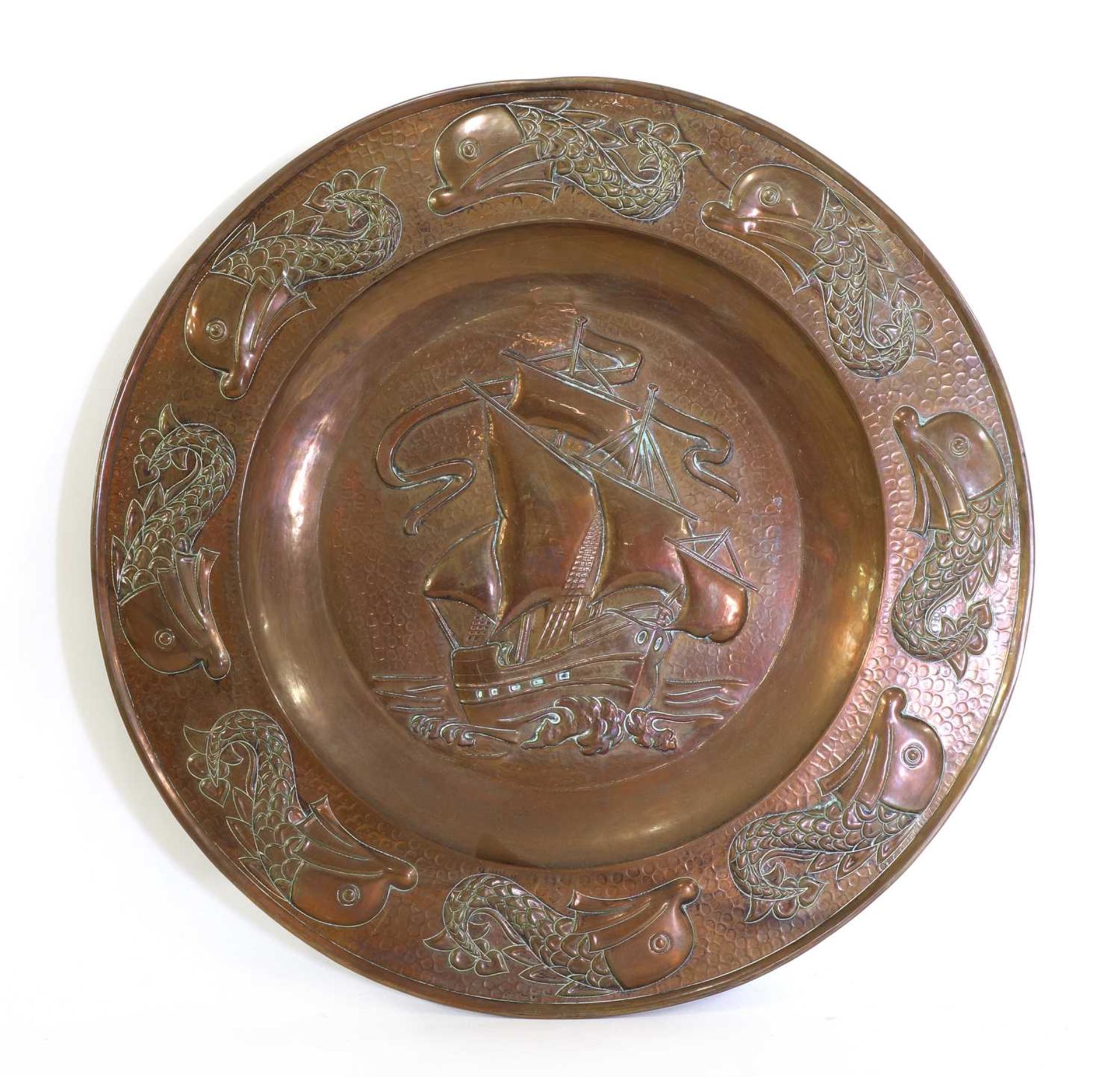 An Arts and Crafts copper charger,
