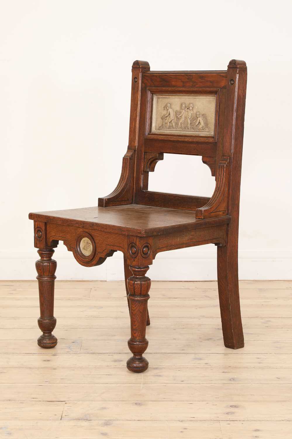 An oak hall chair,