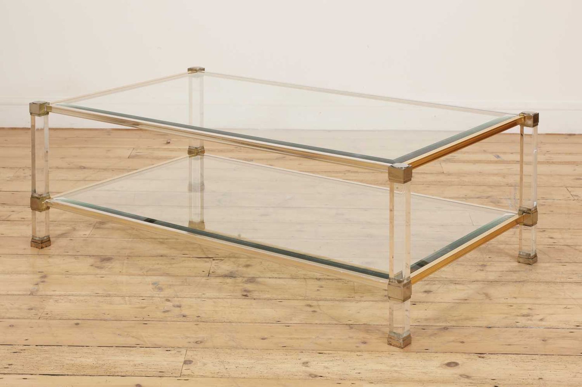 A Pierre Vandel Lucite and glass two-tier coffee table,