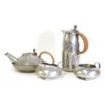 A matched 'Tudric' pewter three-piece tea set,