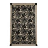 An Art Deco-style black and white wall hanging,