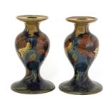 A pair of Rozenburg den Haag candlesticks,