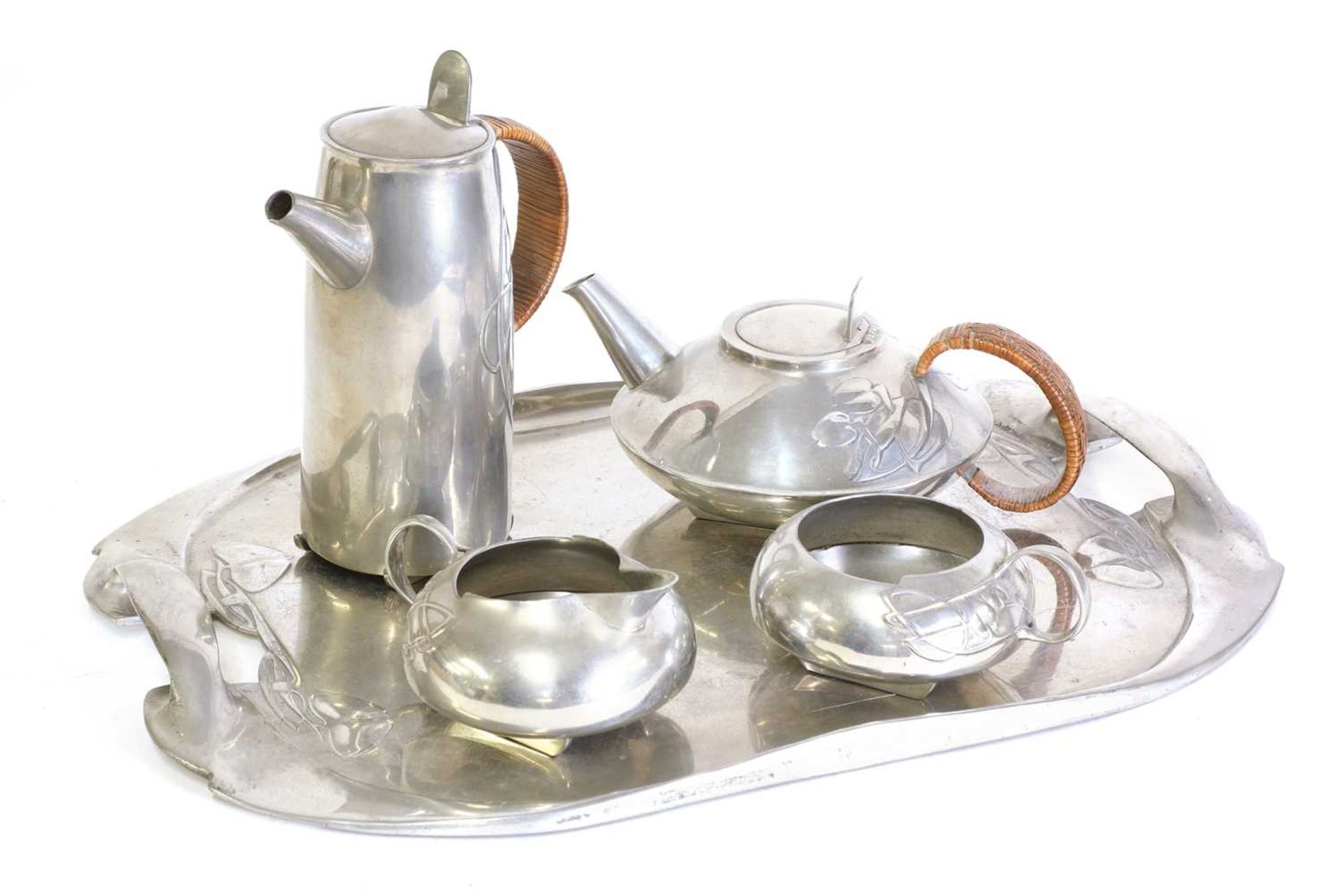 A matched 'Tudric' pewter three-piece tea set,