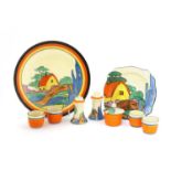 A collection of Clarice Cliff ‘Orange Roof Cottage’ items,