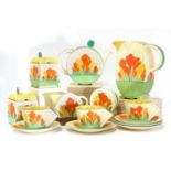A collection of Clarice Cliff ‘Sungleam Crocus’ Bonjour shaped items,
