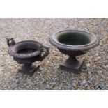 A cast iron Campana urn,