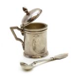 A Cartier silver mustard pot and spoon,