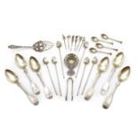 A collection of silver flatware