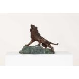 An Art Deco style bronze figure of a lion,