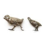 Two novelty silver pepperettes,